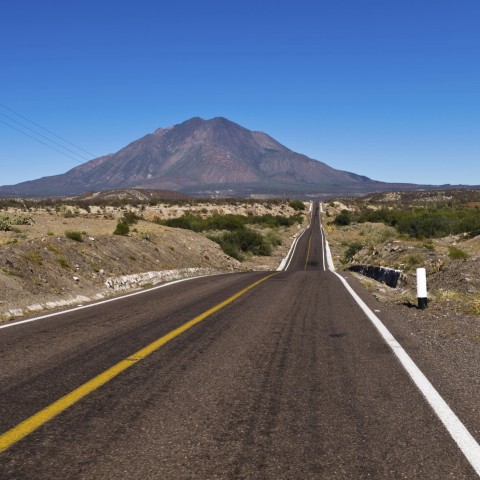 Tarred Road with Mountain on Background