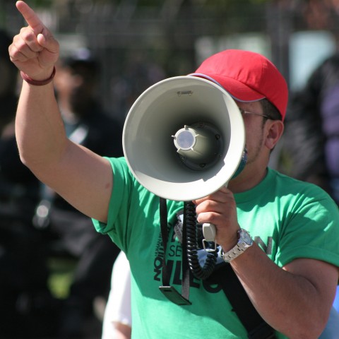 Someone Speaking into a Megaphone