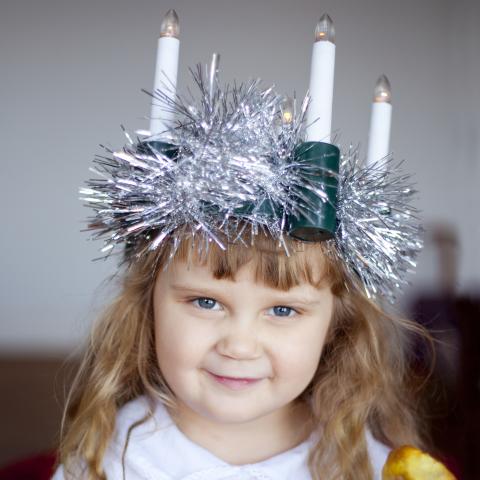 A Little Girl Dressed as the Lucia Maiden