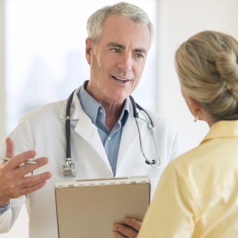 A Doctor Consulting with a Patient