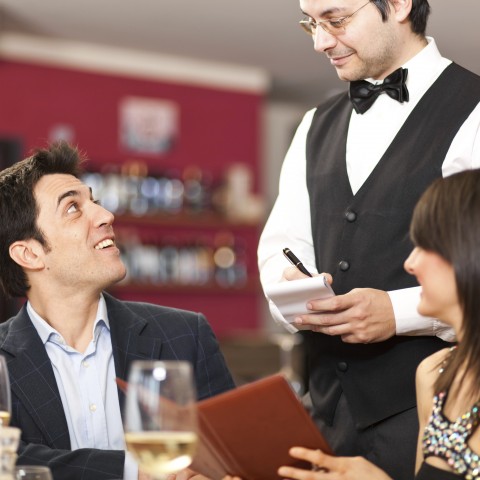 A Man Making an Order at a Restaurant