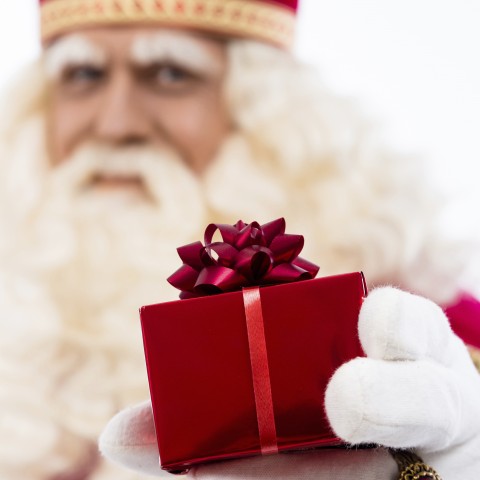 Santa Claus Holding a Present