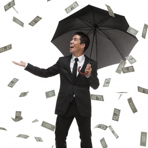 A Man Holding an Umbrella while Money Is Raining, Signifying Something Unbelievable