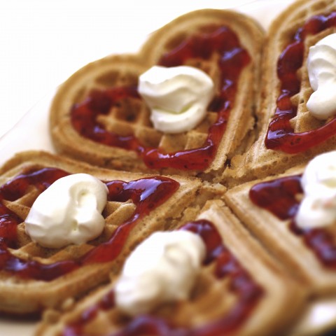 A Waffle with Cream and Jam on It