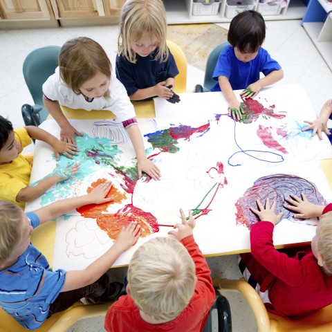 A Bunch of Kids Finger Painting