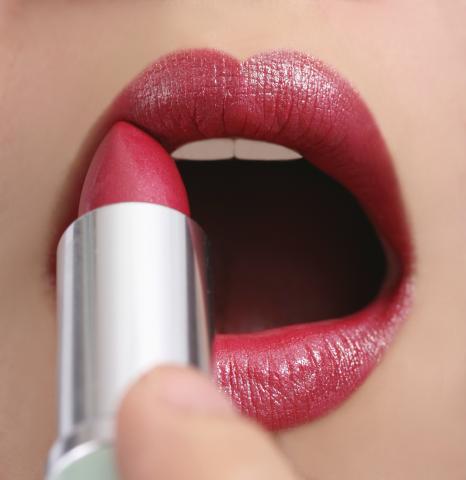 Lips with Lipstick being Applied.