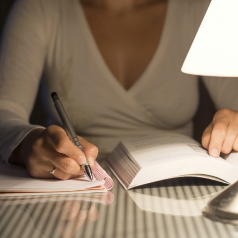 A Woman Studying Late at Night 