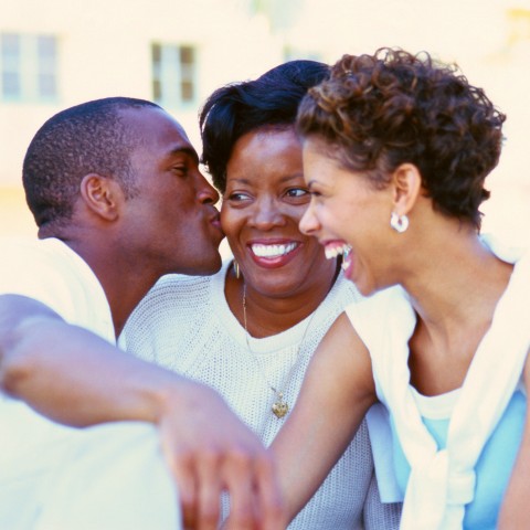 Man Kissing His Mother-In-Law on the Cheek