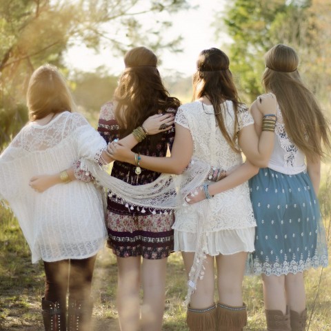 A Group of Girls Hugging from Behind