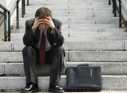 A Businessman Feeling Gloomy and Depressed After a Bad Day at Work