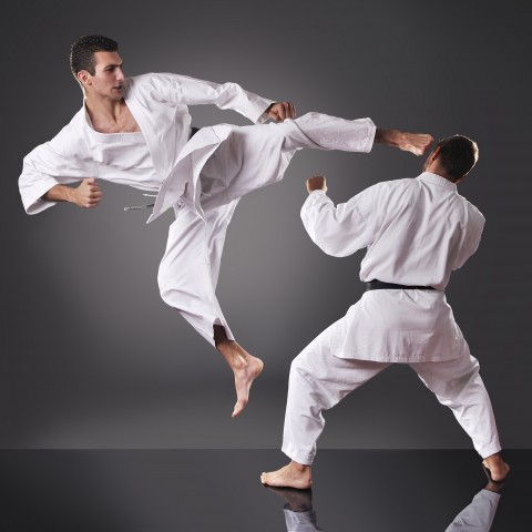 Two People Sparring in Karate Gis 