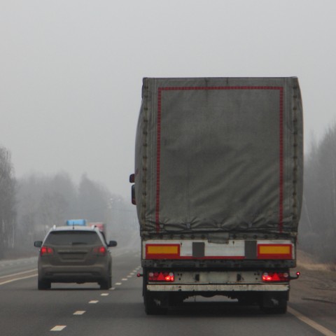 Cars Driving in Fog