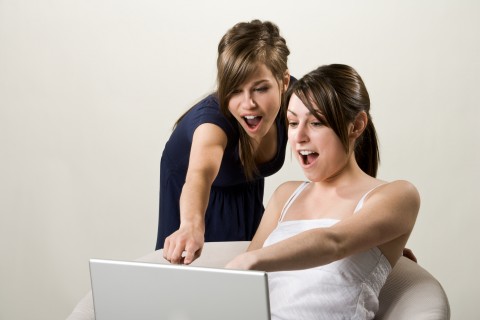 Two Girls Giving a Wow Gesture