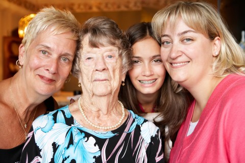 A Family Photograph Having a Daughter, a Mother, Grandmother, and a Great-Grandmother in a Single Frame