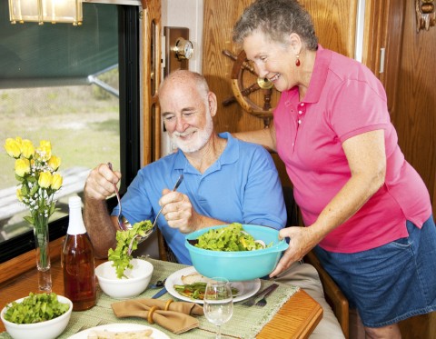 A Sweet Couple Preparing Salad