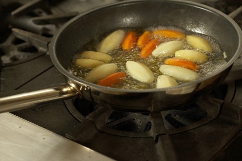 Potatoes and Carrots Simmering in a Pan