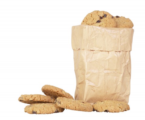Chocolate Chip Cookies Beside and Inside a Brown Paper Bag