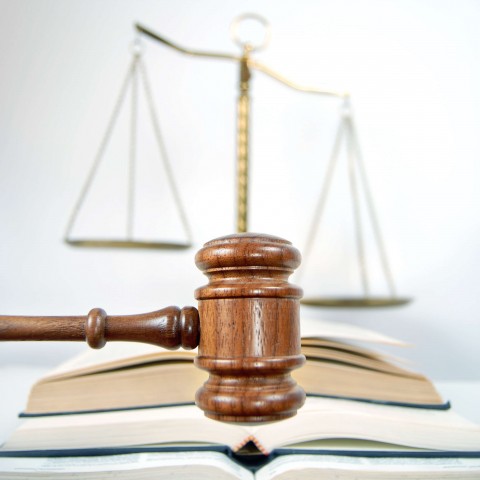 An Image of a Gavel and Legal Books, Signifying the Judicial System