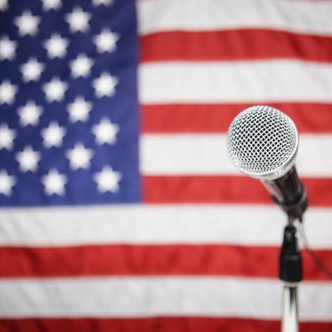 Microphone in Front of American Flag