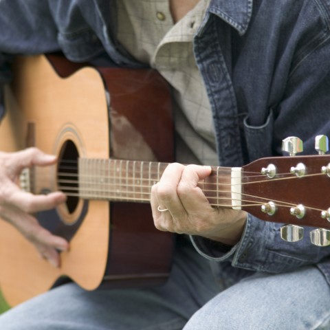 Man Playing Guitar