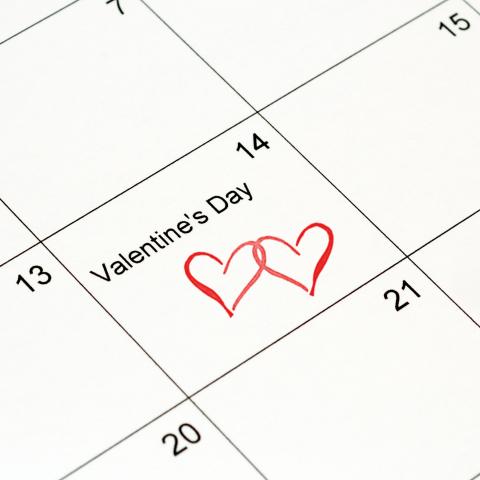 Valentine's Day Marked on Calendar with Hearts