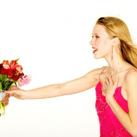 A Female Accepting a Flowers