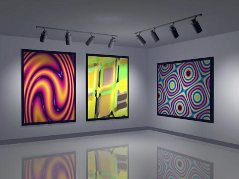 Colorful modern paintings displayed in an art gallery