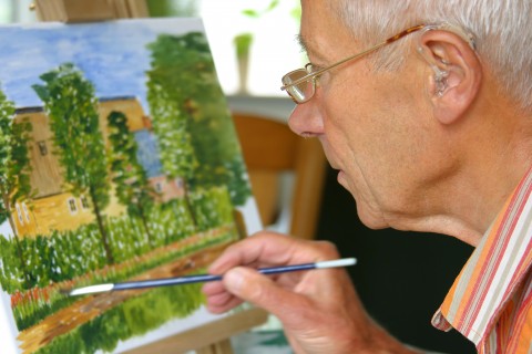 Old Man Painting Scenery