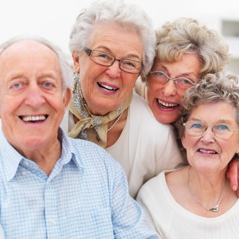 Four Smiling Elderly People.