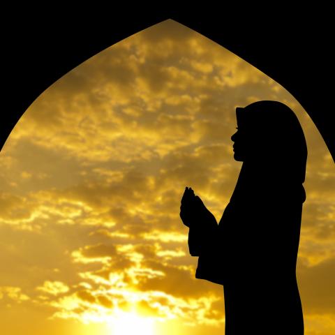 Silhouette of Woman Praying on Ramadan