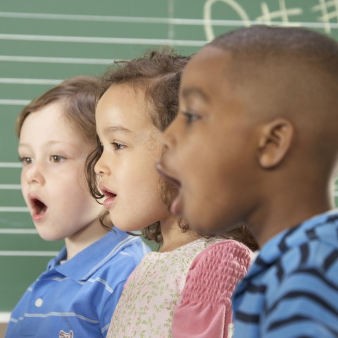 Three Children Singing a Song