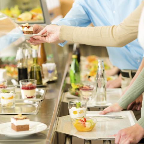 Image of People Getting Their Own Food from a Shelf