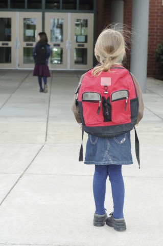 Kid with Backpack Arriving at School