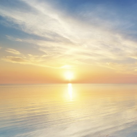 Pastel Clouds Over the Ocean