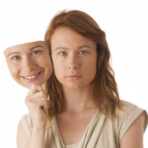 Woman Taking Away Fake Mask from Face