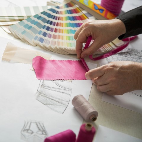 A Fashion Designer Testing Colors and Fabrics