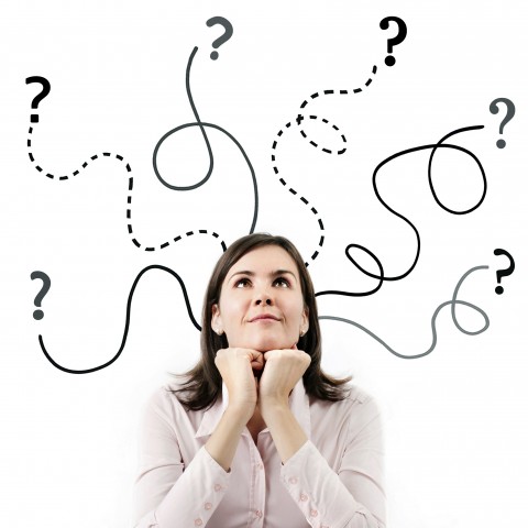 A Woman Thinking with Question Marks Above Her Head