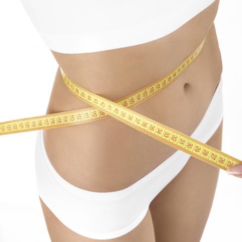 Woman's Waist with Measuring Tape