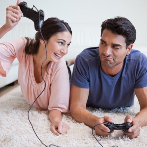 a Couple Playing Video Games Together