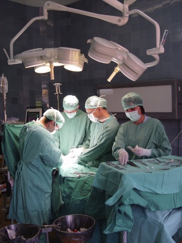 Doctors Around Operating Table in Theater