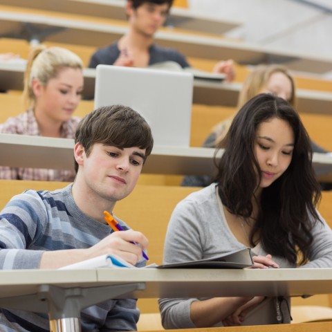 A young man and woman taking a class together