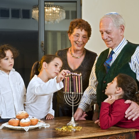 Jews Lighting Menorah