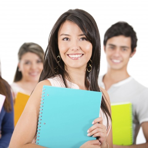 Happy Students Holding Their Notebooks