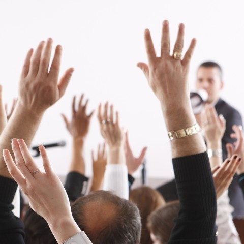 People Raising Their Hands