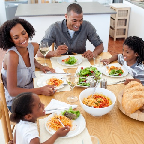 A Happy Family Eating Together