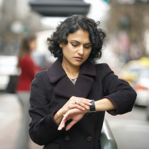 Woman Checking Her Watch