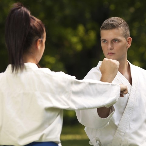 Two People Engaging in Martial Arts