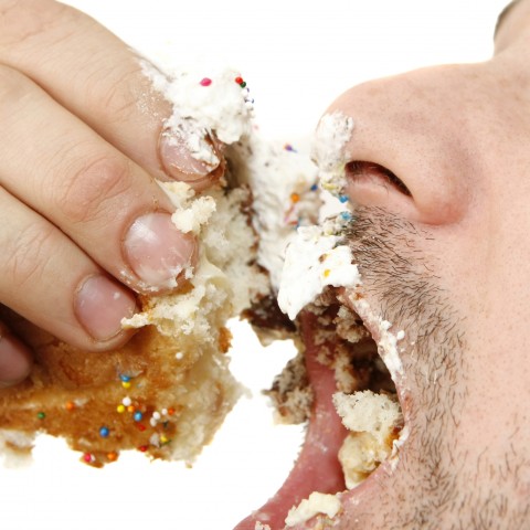 Man Eating Cake