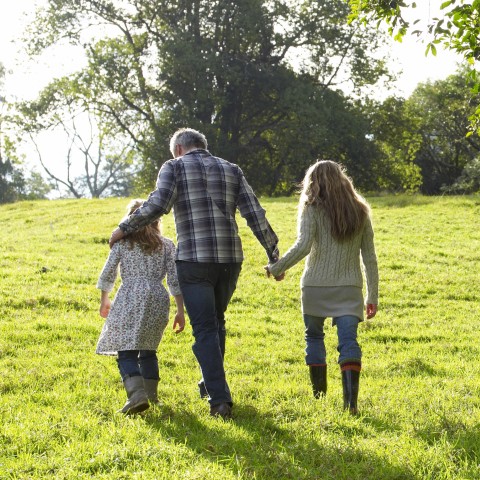 Family Out Walking in Field