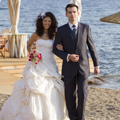 A Young Couple Getting Married by the Beach